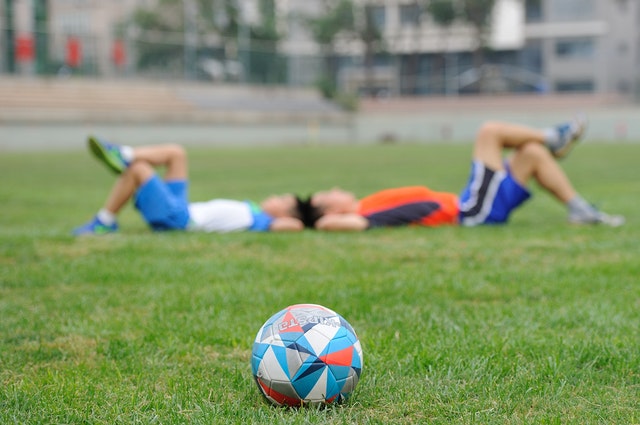 football players lying down