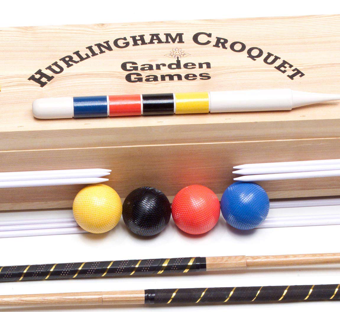 Hurlingham mallets with cylindrical brass bound heads and an inlaid sighting line